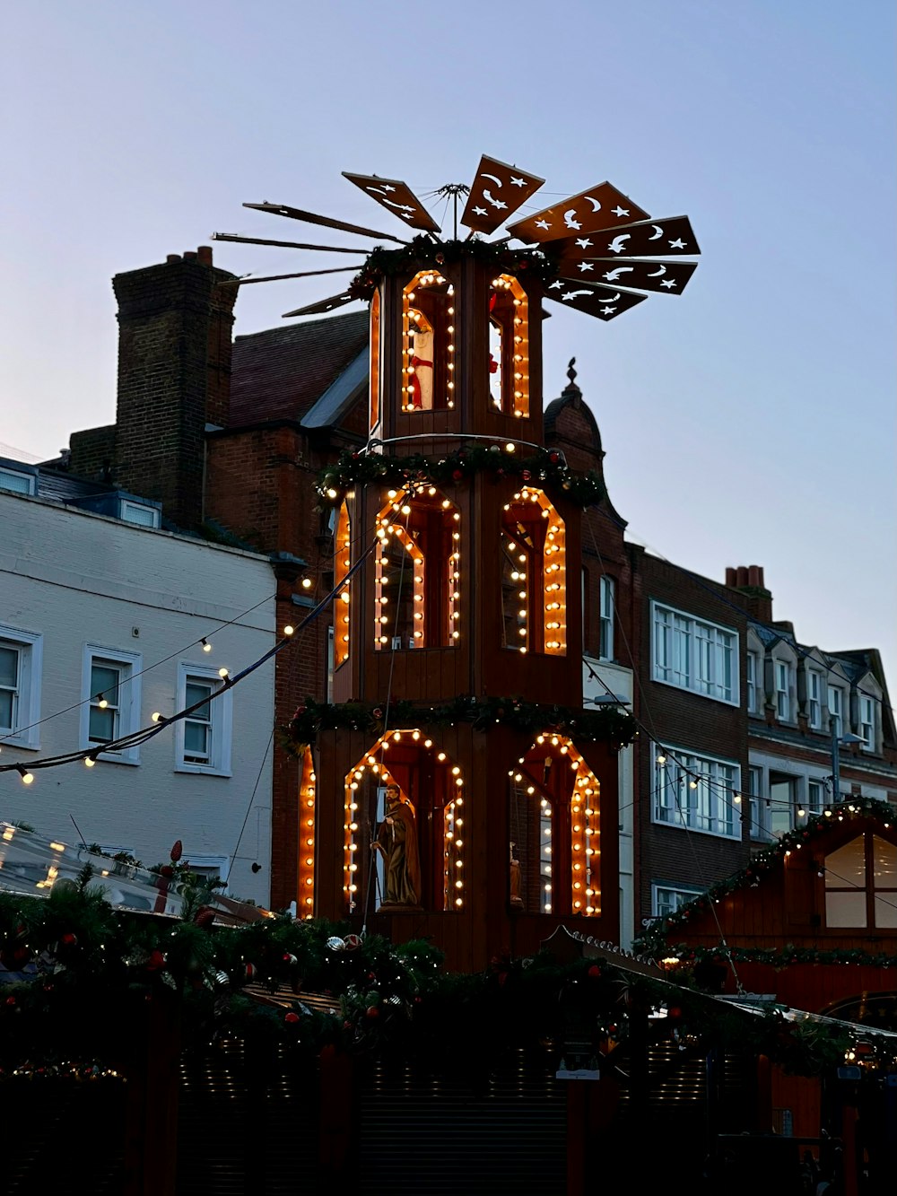 a tall tower with a clock on top of it