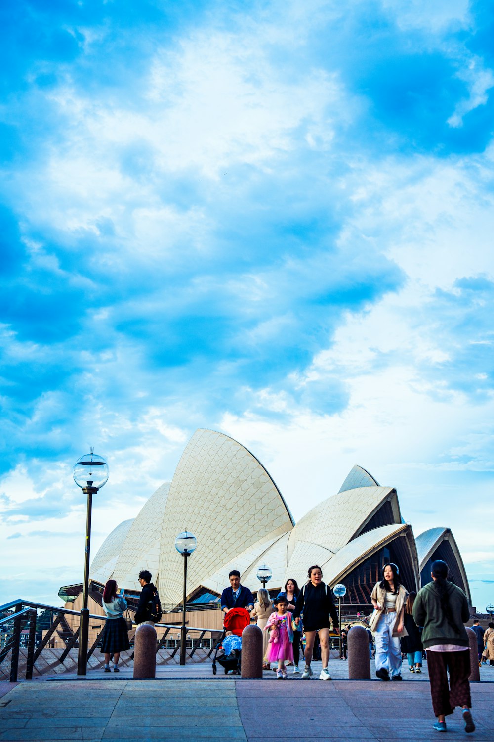 a group of people standing in front of a building