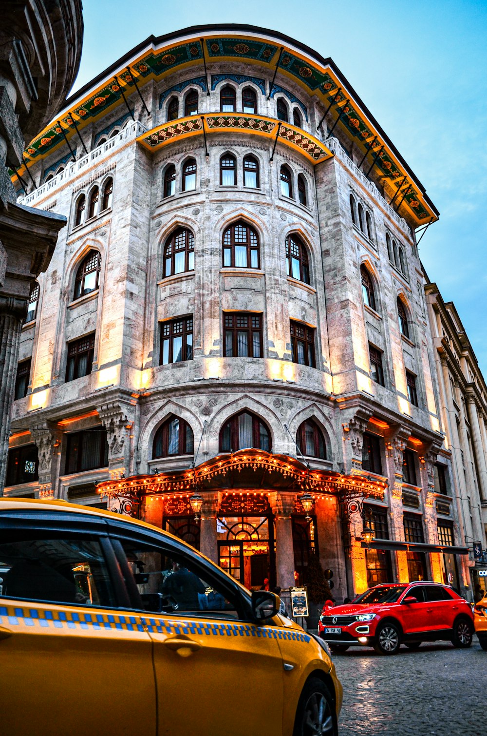 a car is parked in front of a building