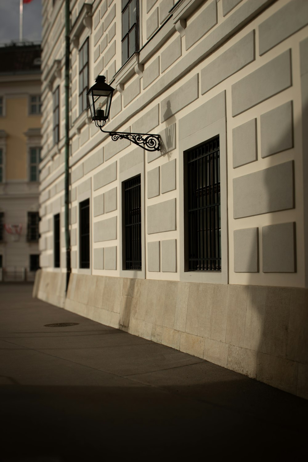 a street light on the side of a building