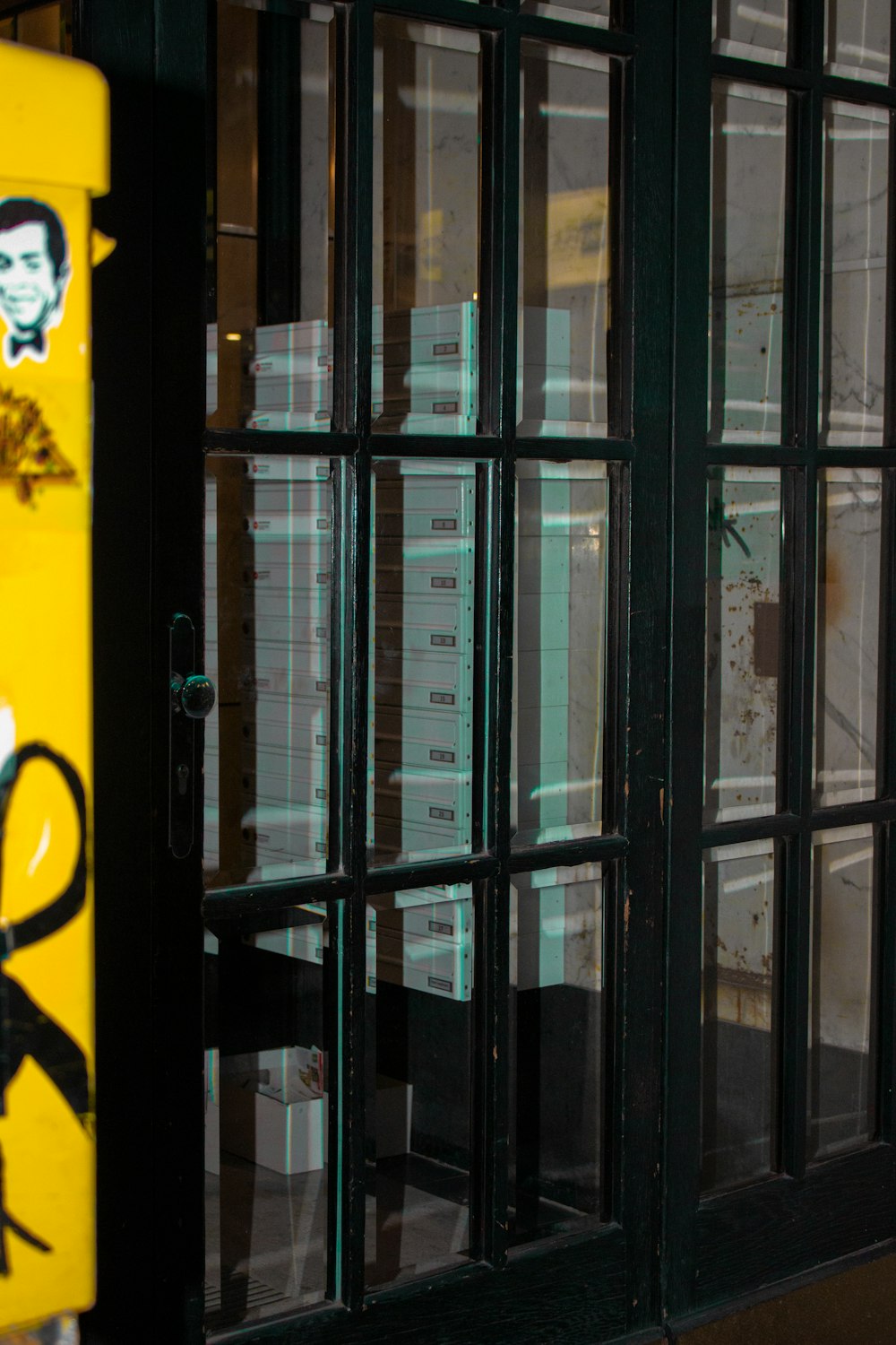 a yellow sign with a picture of a man on it