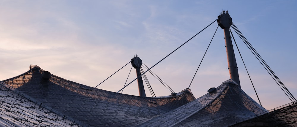 the roof of a building with a sky background