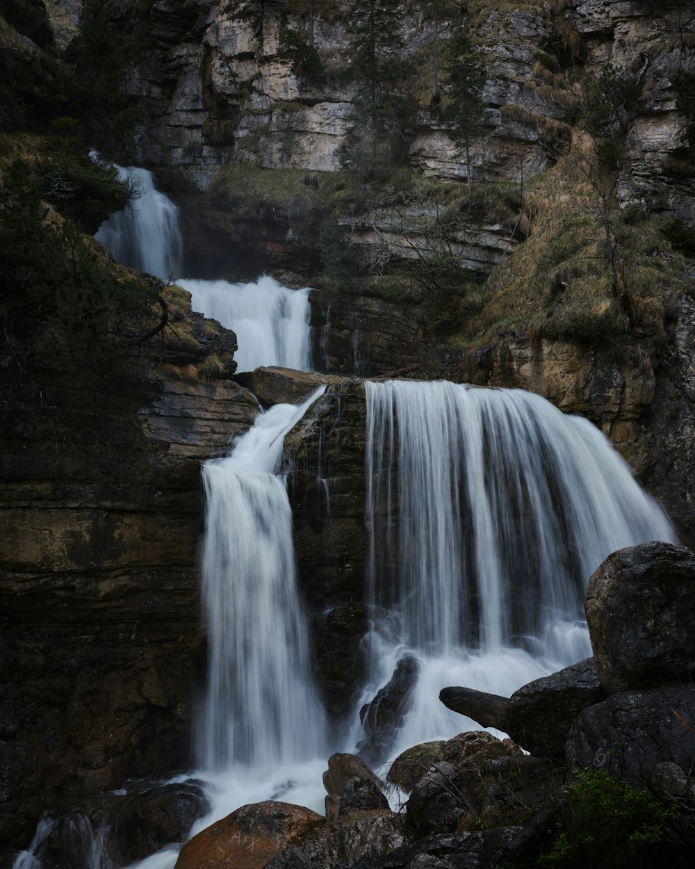 a large waterfall with lots of water coming out of it