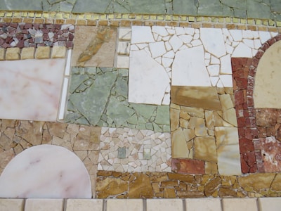 a tiled floor with different colors and shapes