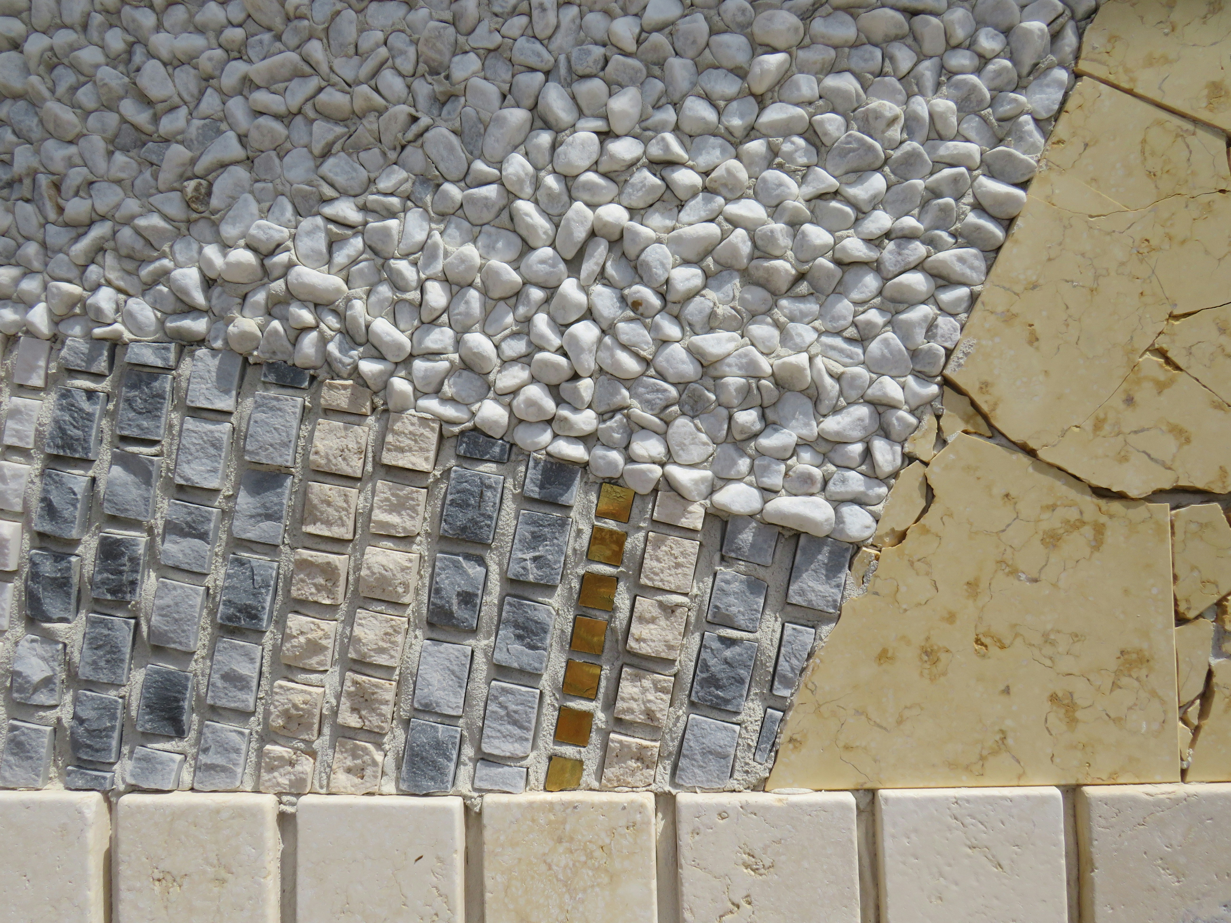 A close-up of tile installation in progress