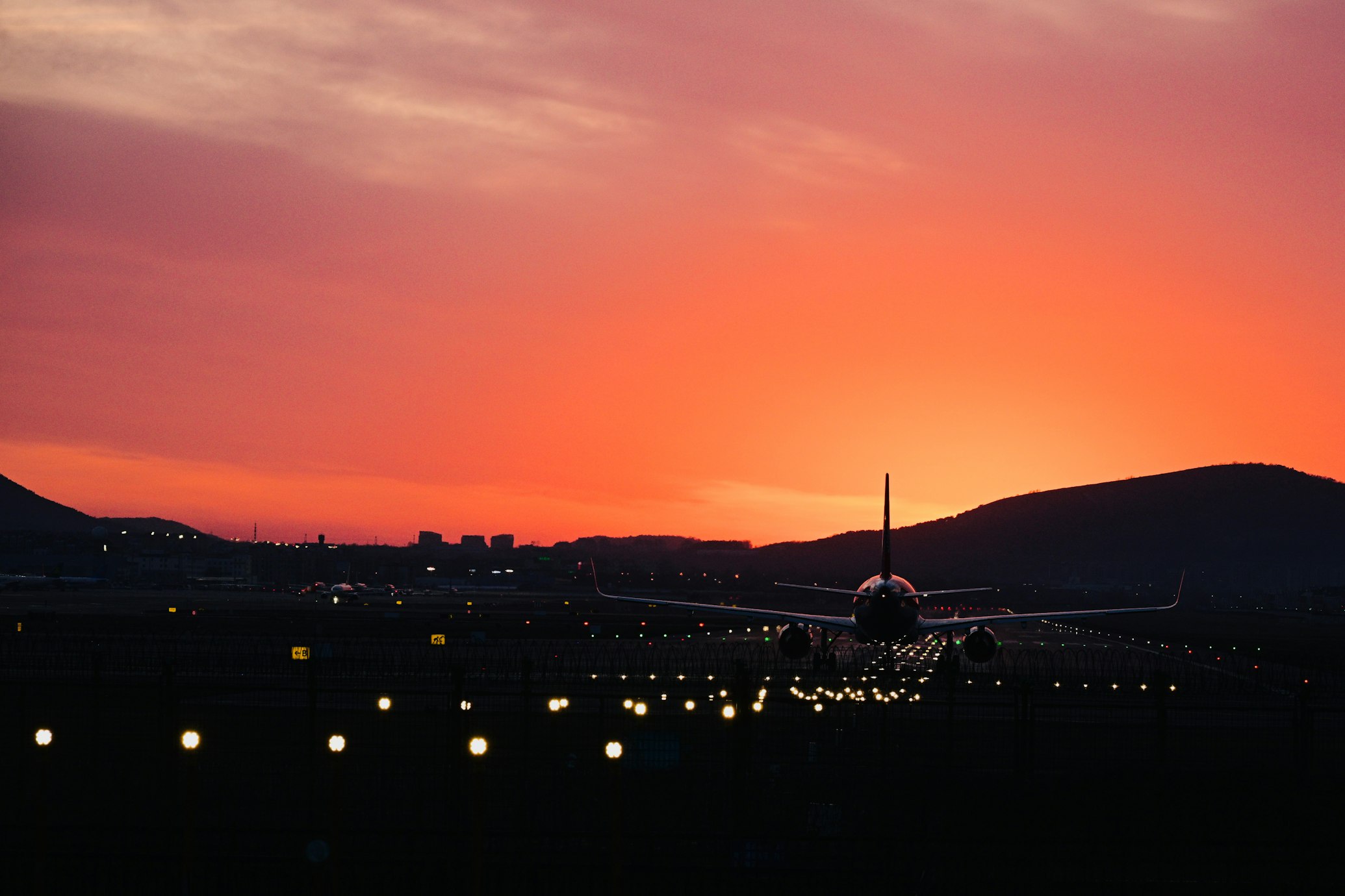Passengers moving through a modern airport terminal