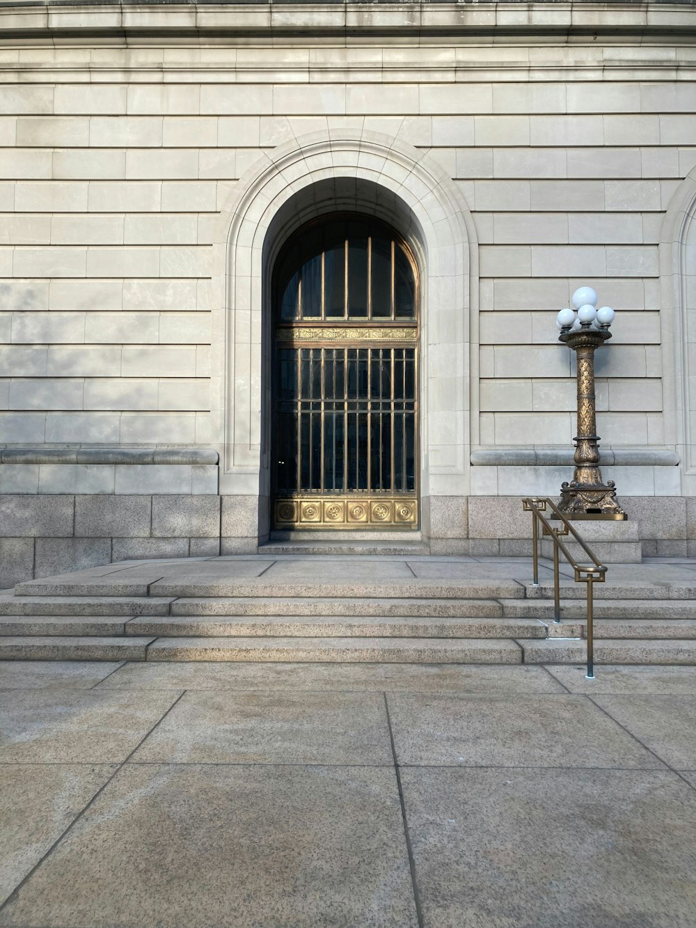 a tall building with a door and a window