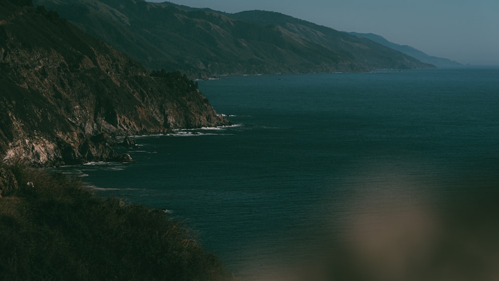 a view of the ocean from a cliff