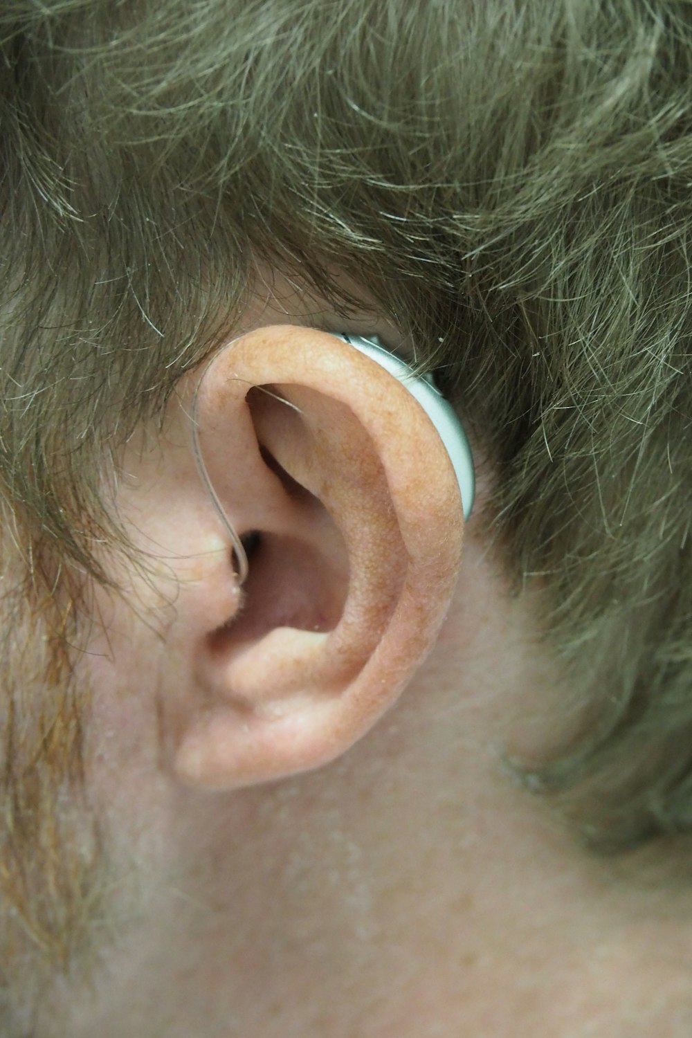 a close up of a person with a fake ear