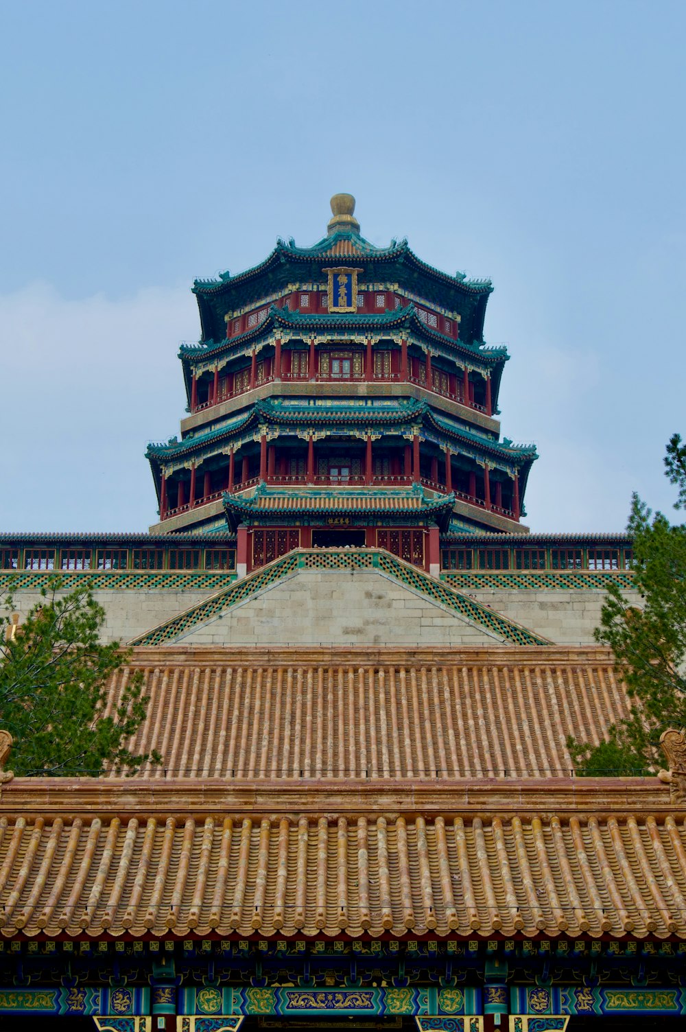 a tall tower with a clock on top of it