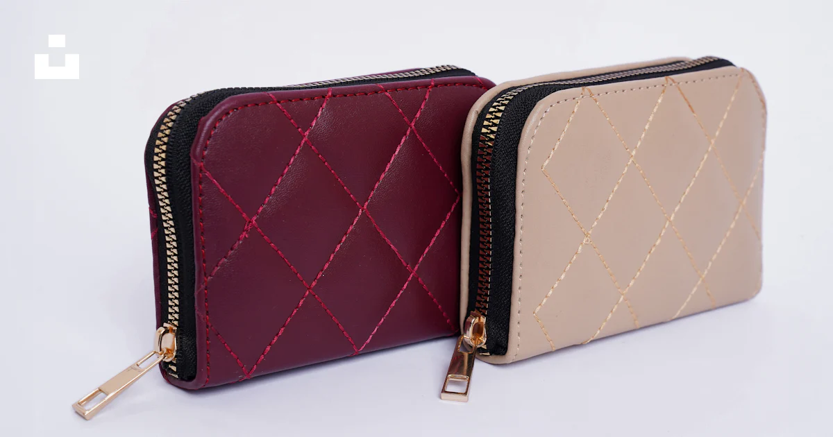 Two wallets sitting side by side on a white surface photo – Free Bag ...