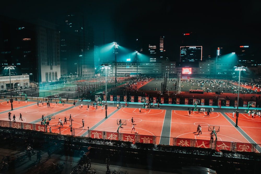 a group of people playing a game of basketball