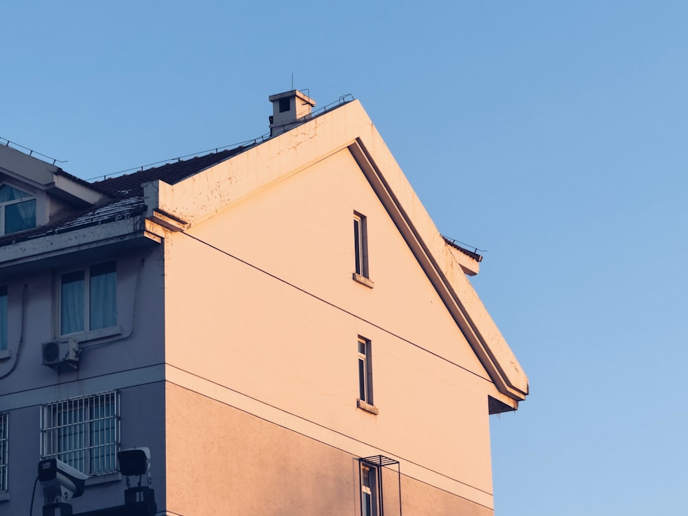 a tall building with a clock on the top of it