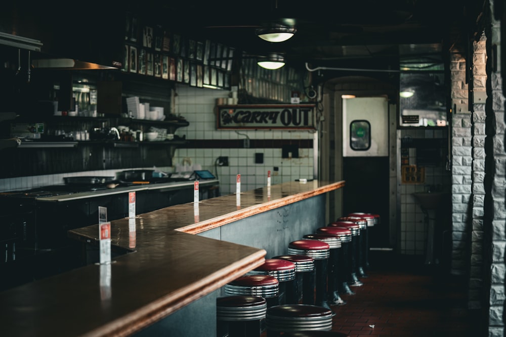 a row of bar stools in a restaurant