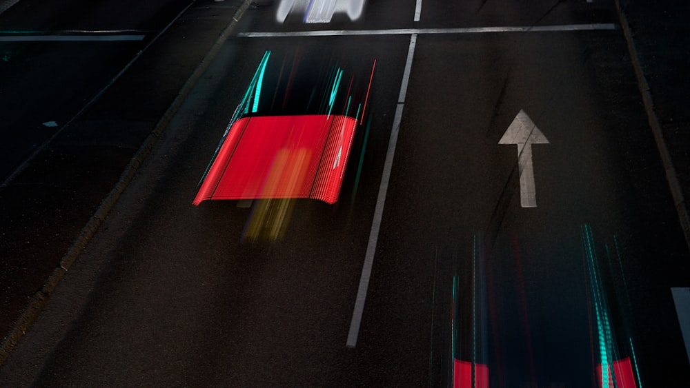 an overhead view of a street with traffic lights