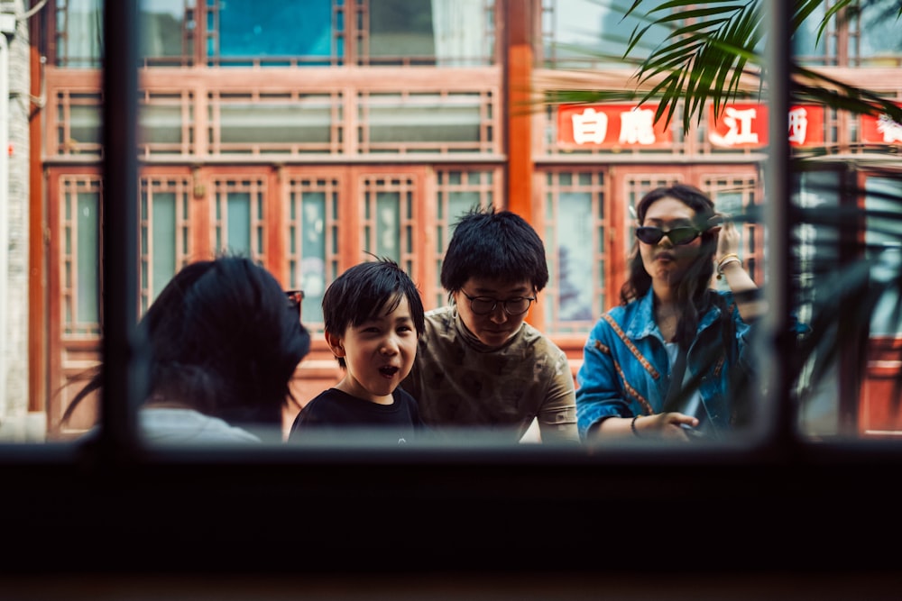 a group of young people standing next to each other