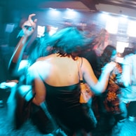 a group of people dancing at a party