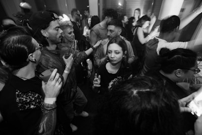 a group of people dancing at a party