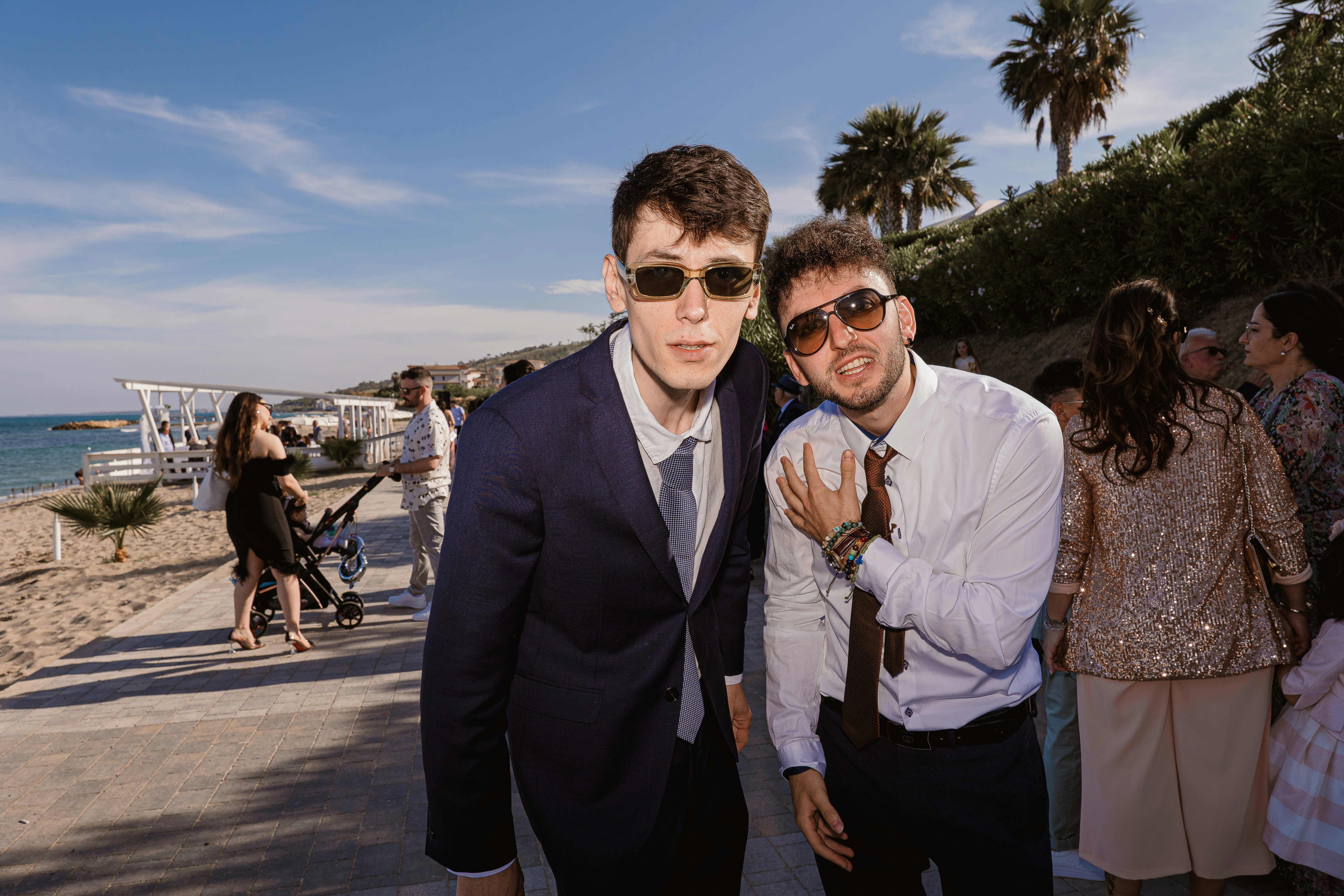 a couple of men standing next to each other