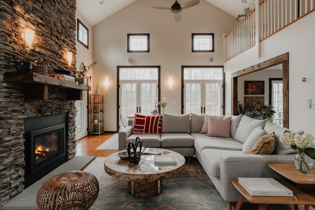 a living room filled with furniture and a fire place, Living Room 1/2 (IG: @clay.banks)