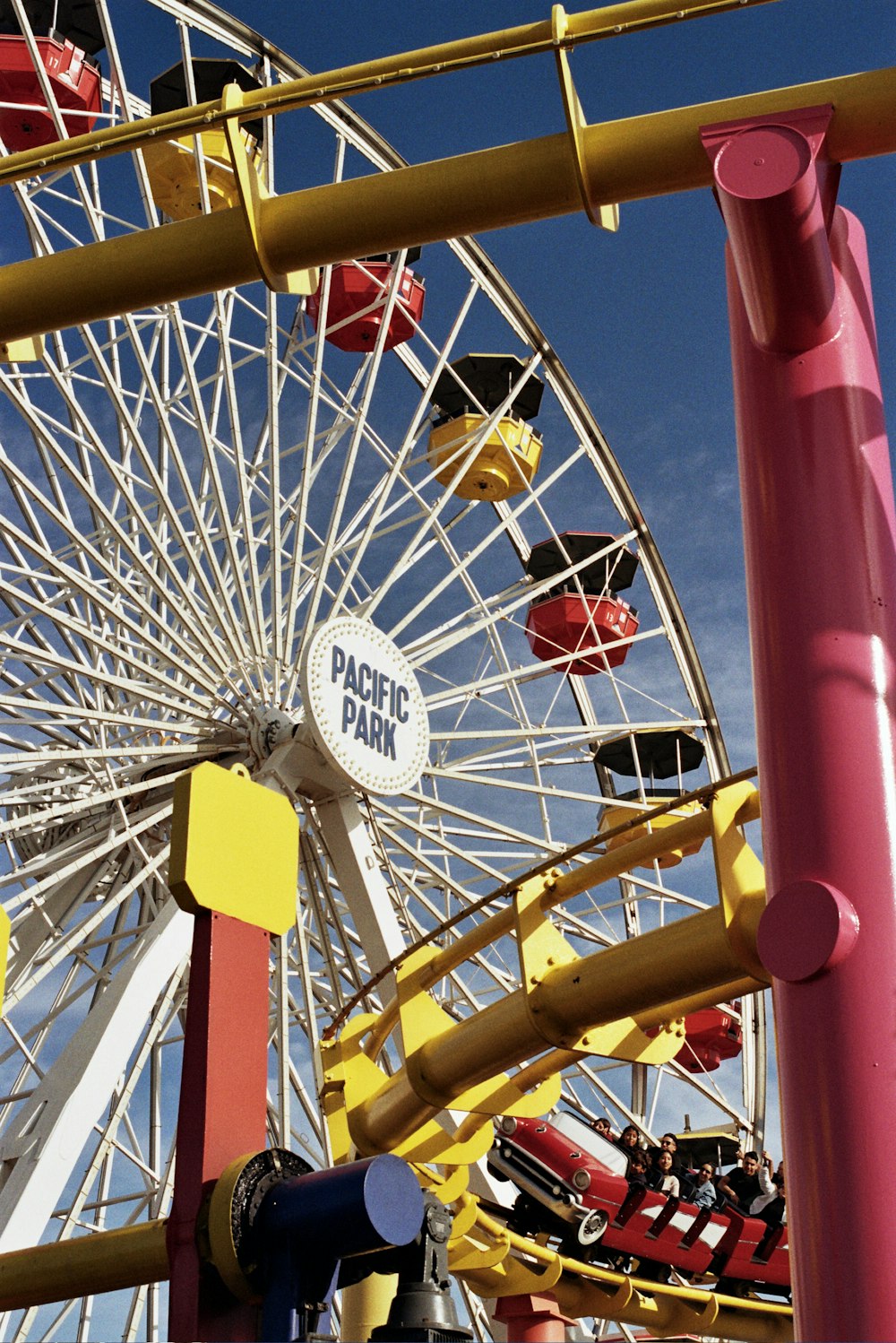 a ferris wheel with a blue sky in the background