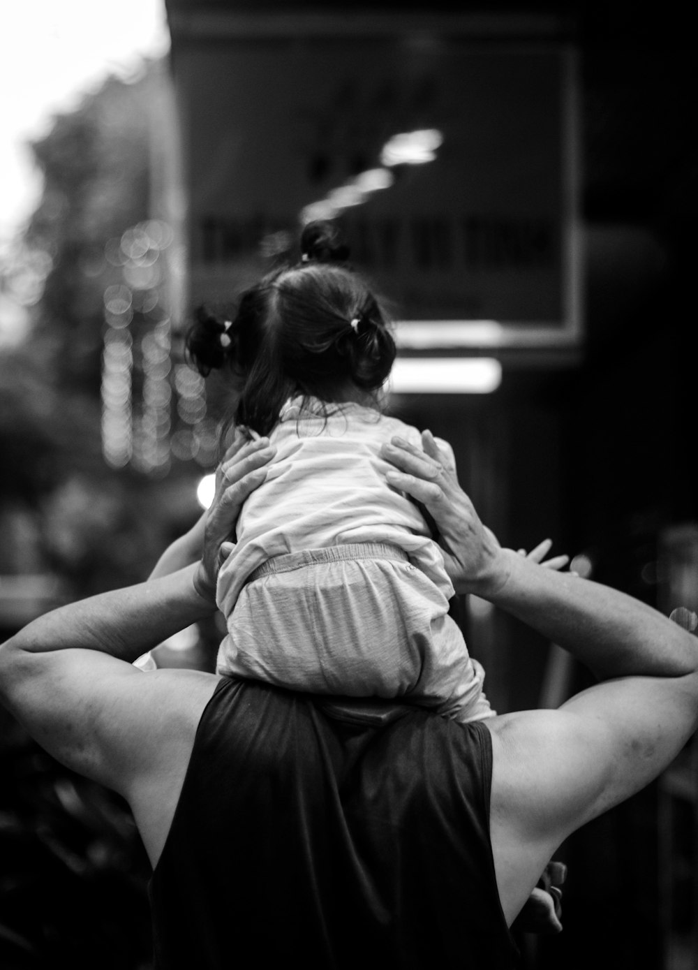 a woman holding a child in her arms