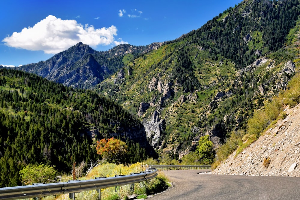 a mountain road in the middle of a valley