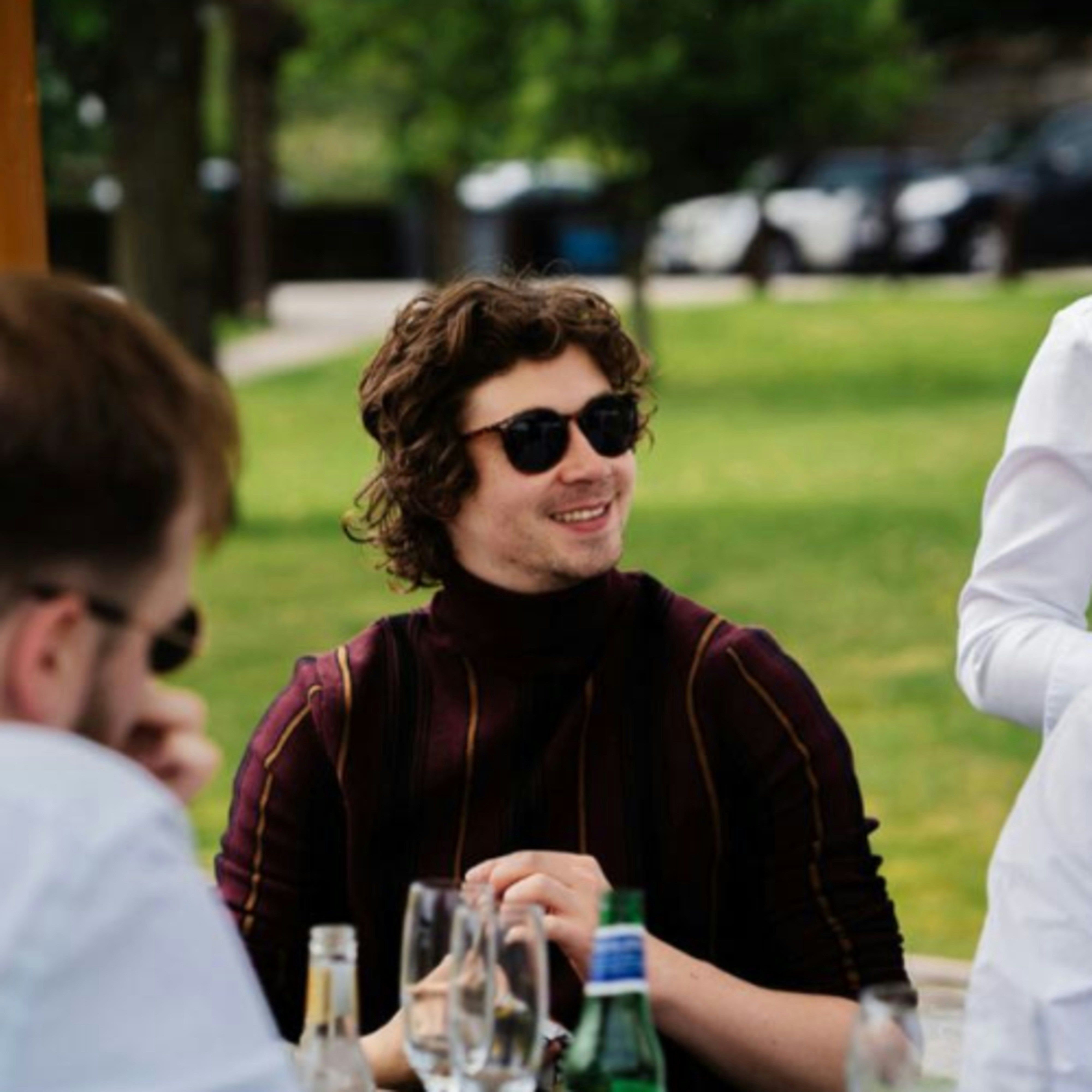 a group of people sitting around a table