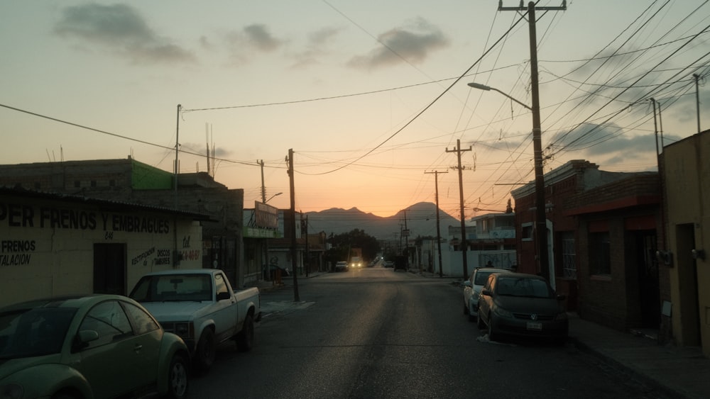 a street with cars parked on the side of it