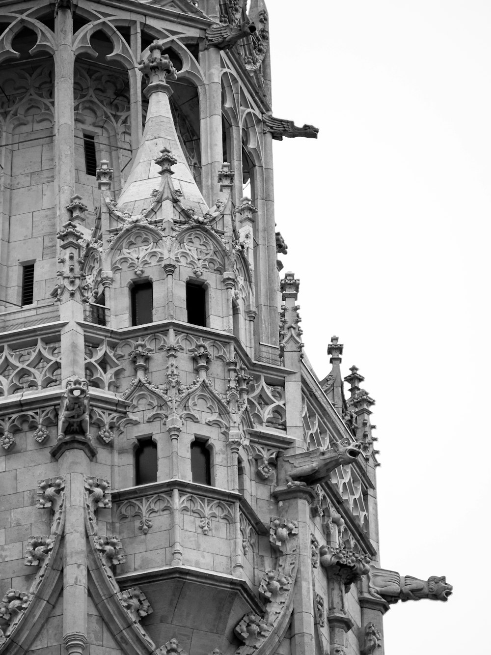 a very tall building with a clock on it's side