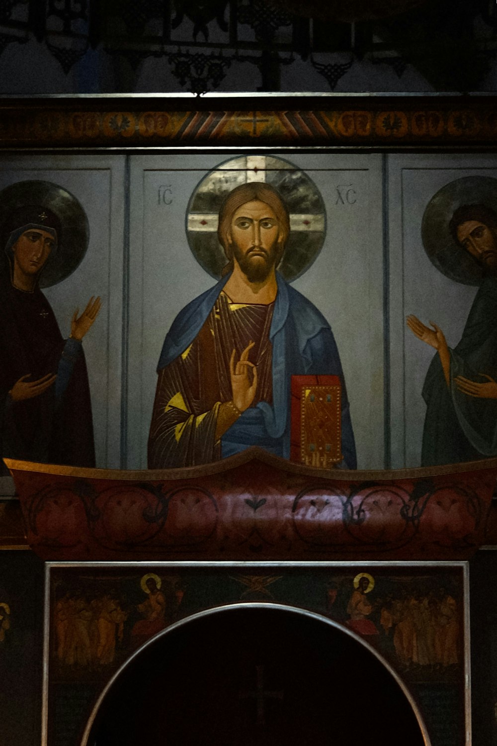 a painting of jesus on the wall of a church