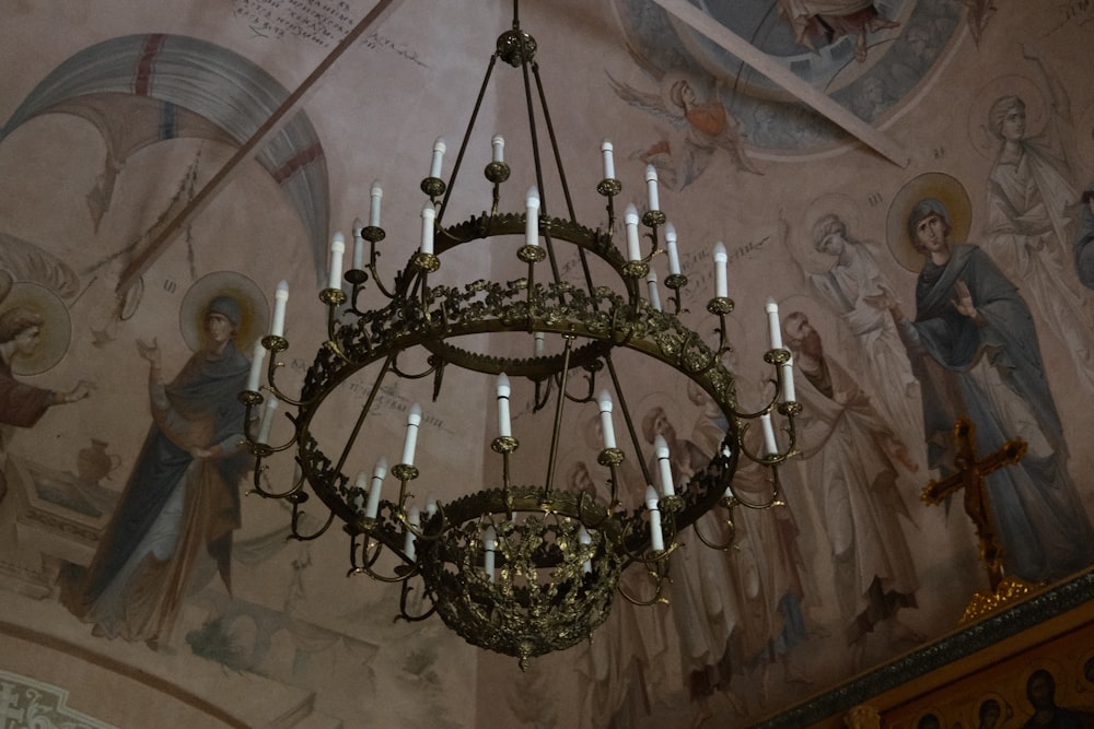 a chandelier hanging from the ceiling of a church