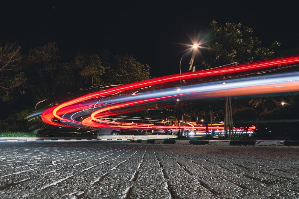 a blurry photo of a street at night