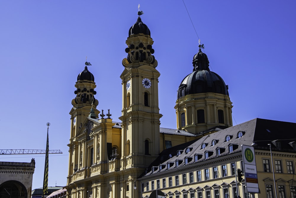 a large building with two towers and a clock