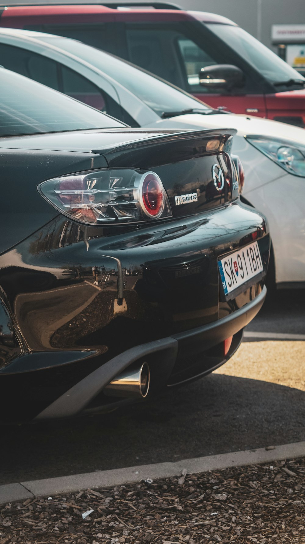 a close up of a car parked in a parking lot