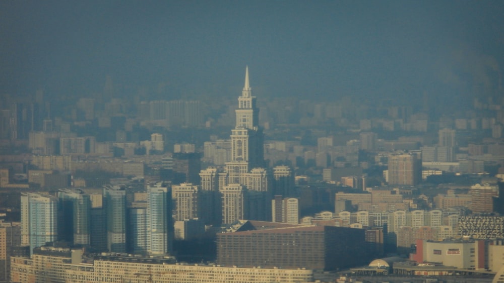 a view of a city with tall buildings