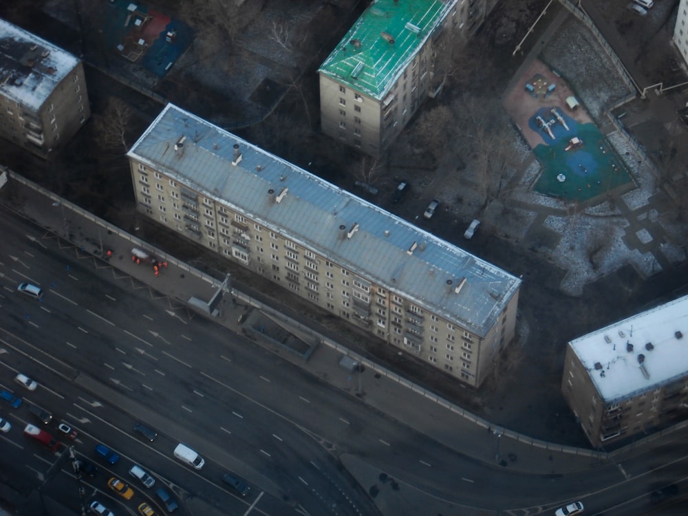 an aerial view of a city street and buildings