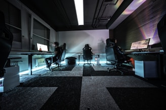 a group of people sitting around a table in a room