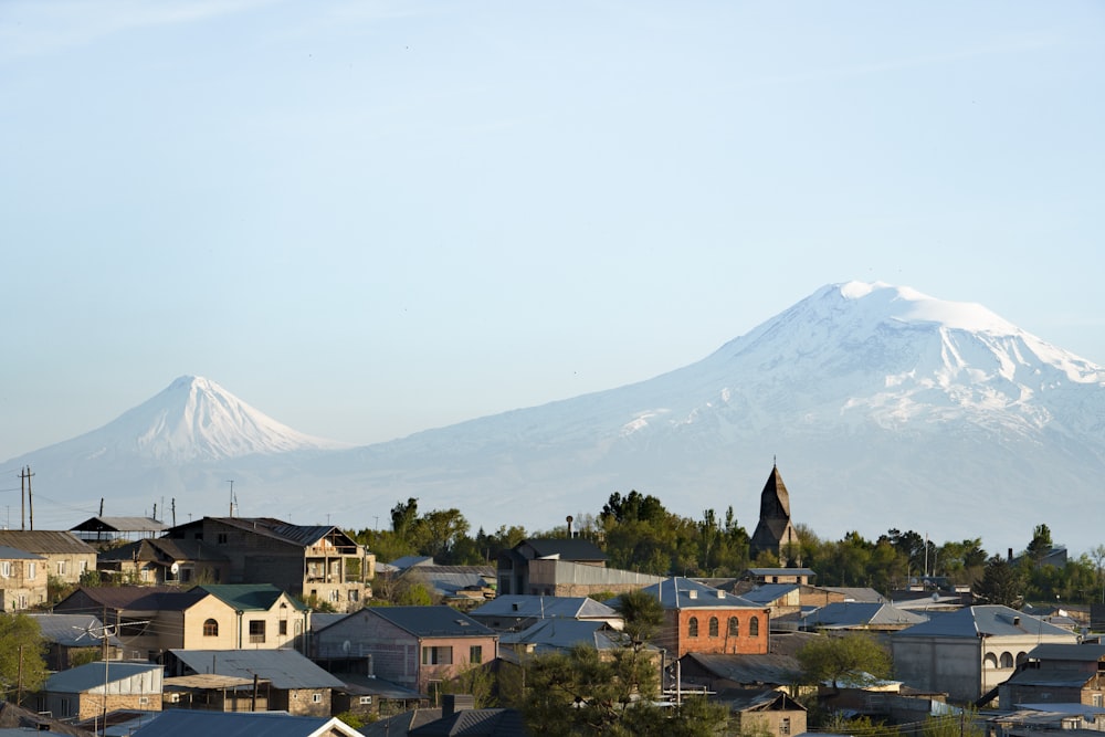 a city with a mountain in the background