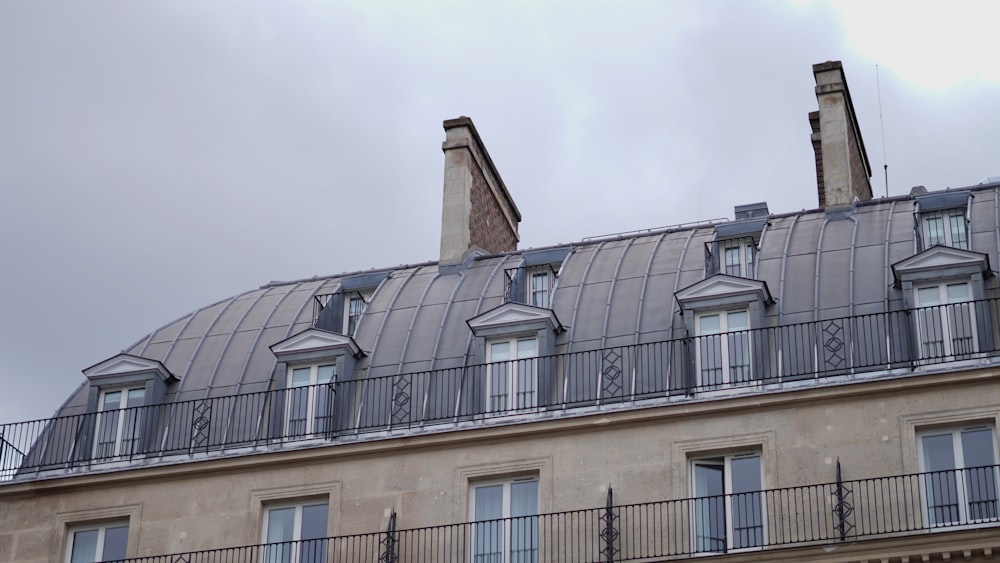 a tall building with a clock on the top of it