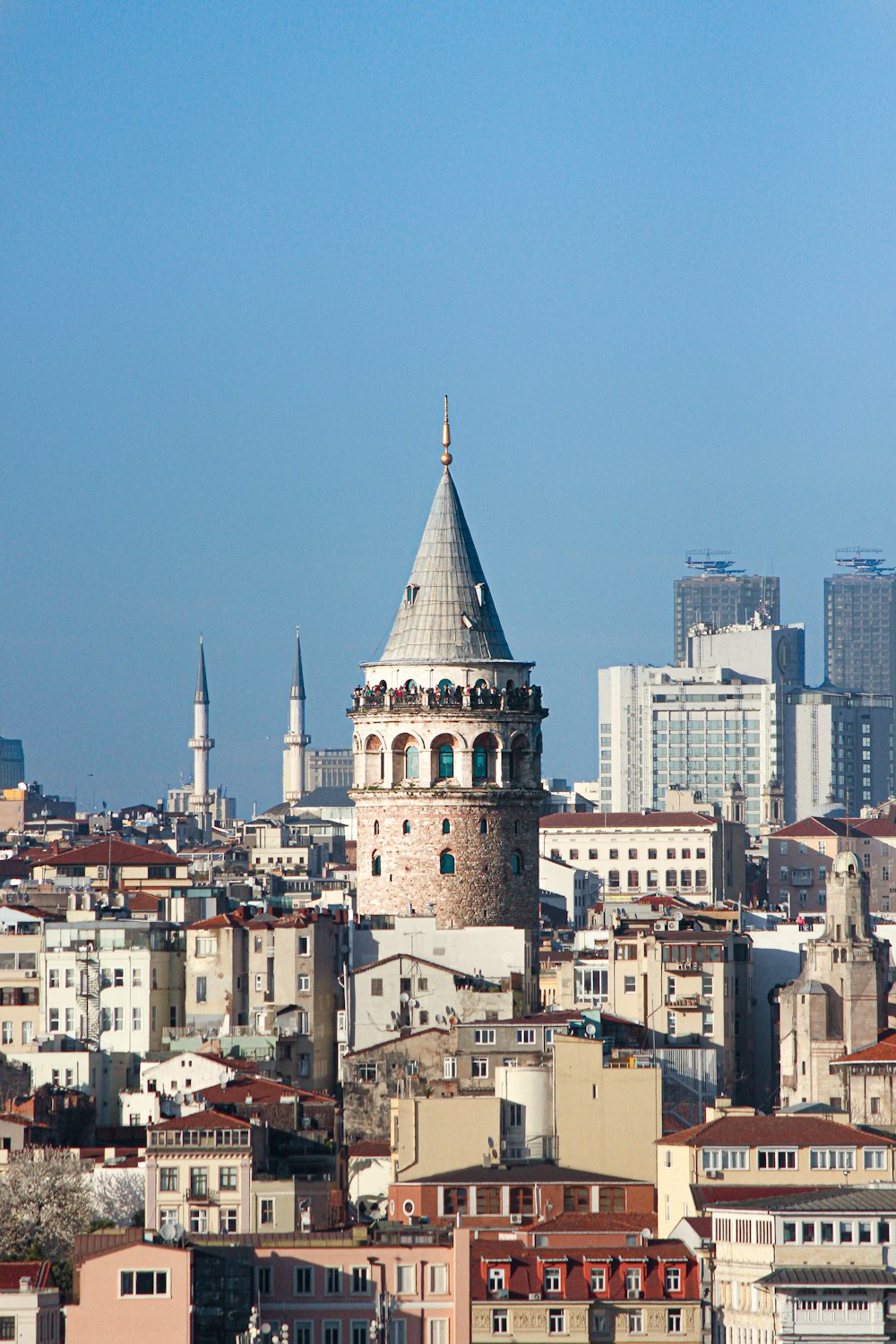 a view of a city with a clock tower