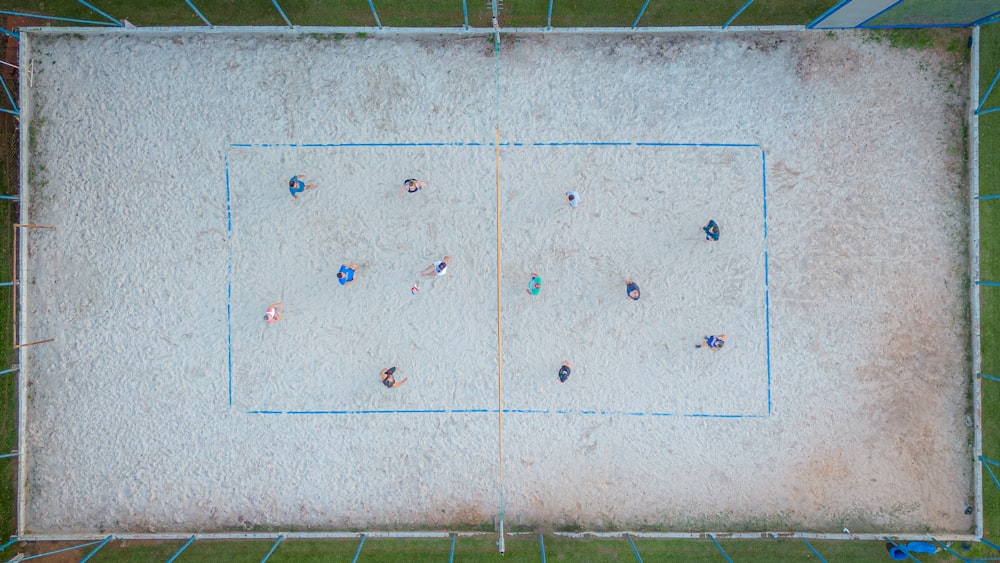an overhead view of a baseball field with people on it