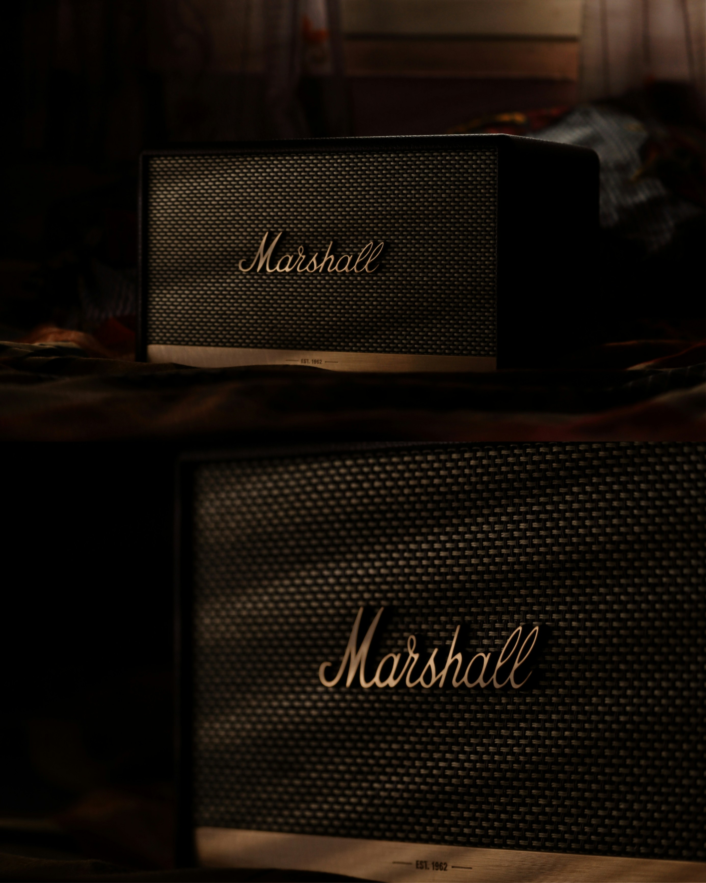 a couple of speakers sitting on top of a table