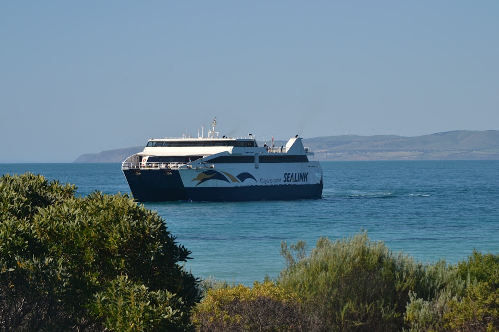 a large boat in the middle of a body of water