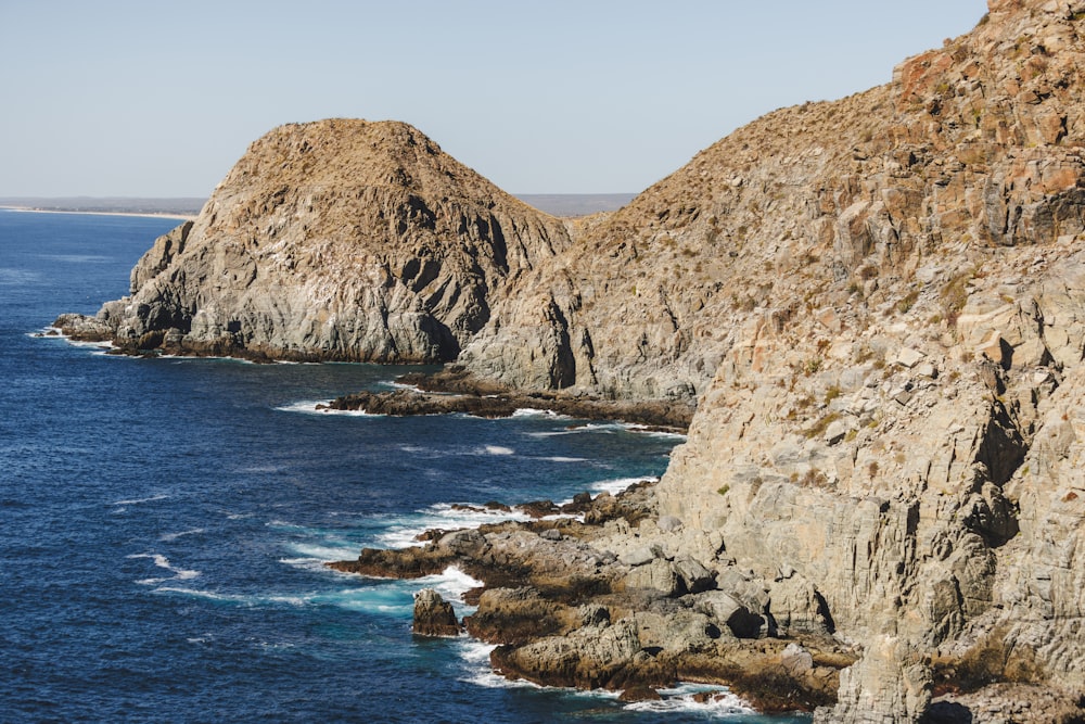 a view of the ocean from the top of a mountain