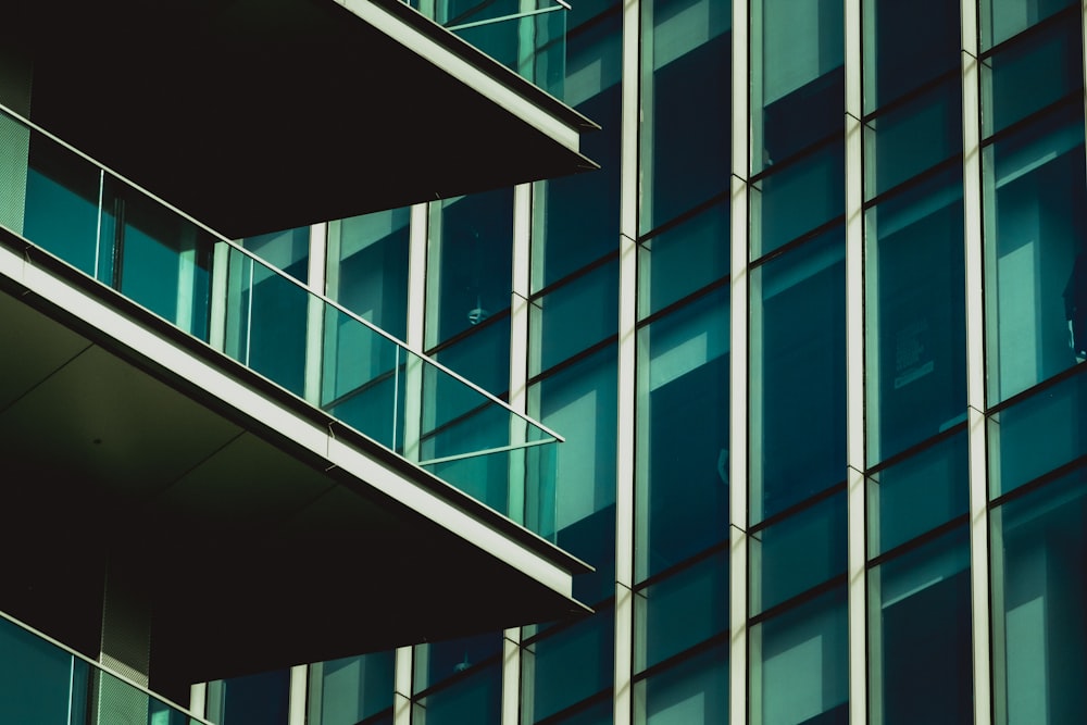 a tall building with lots of windows next to it