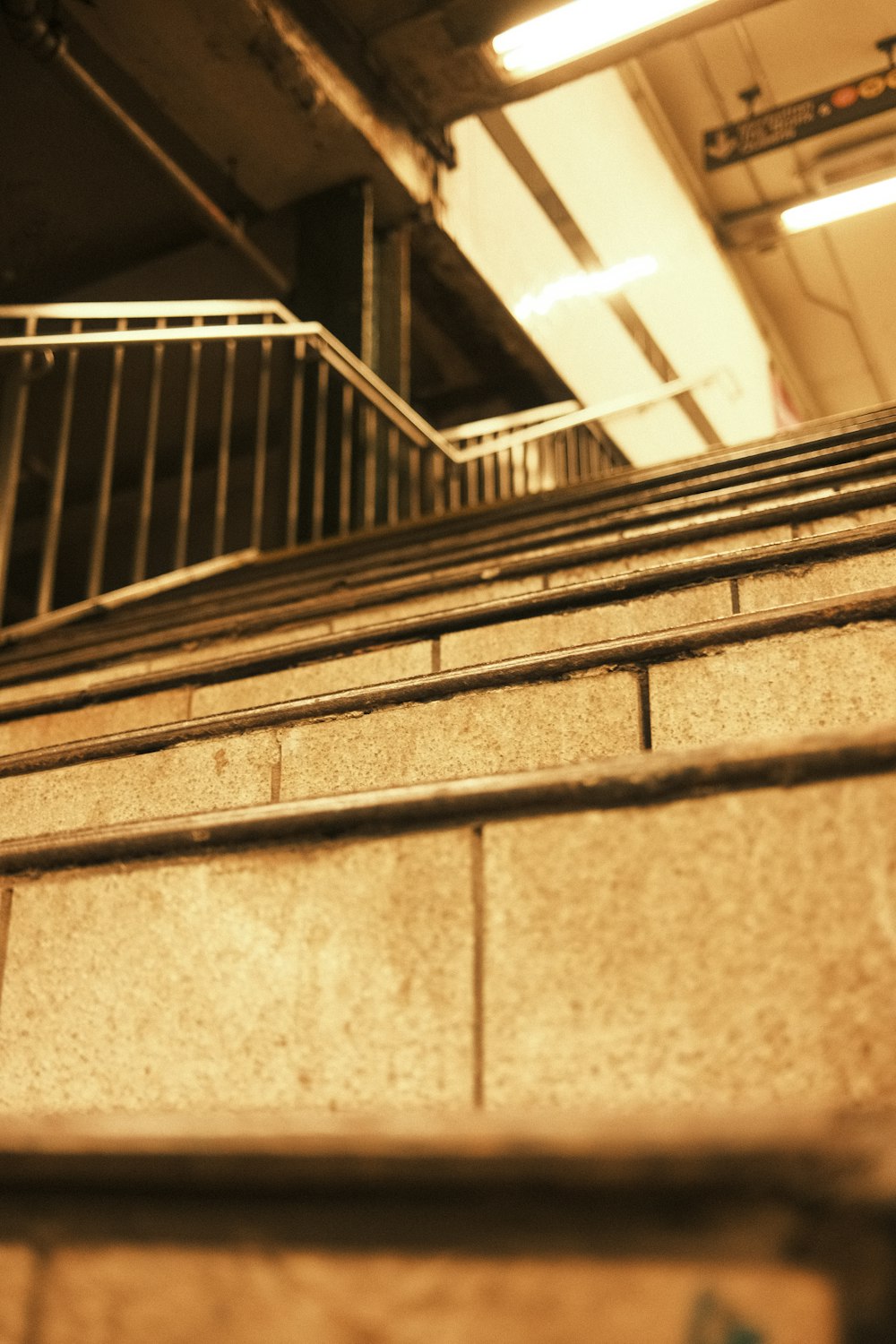 a stair case in a building with metal railings