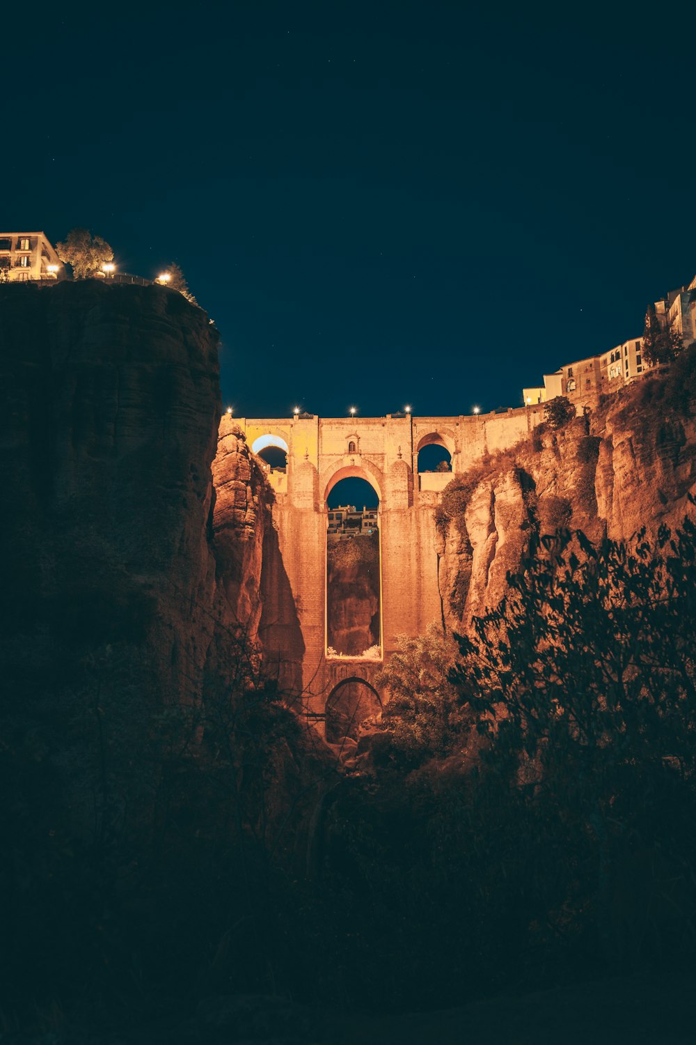 a bridge that is lit up at night