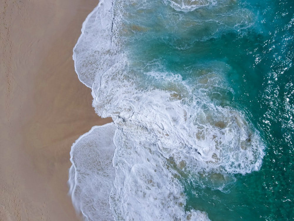 an aerial view of a beach and ocean