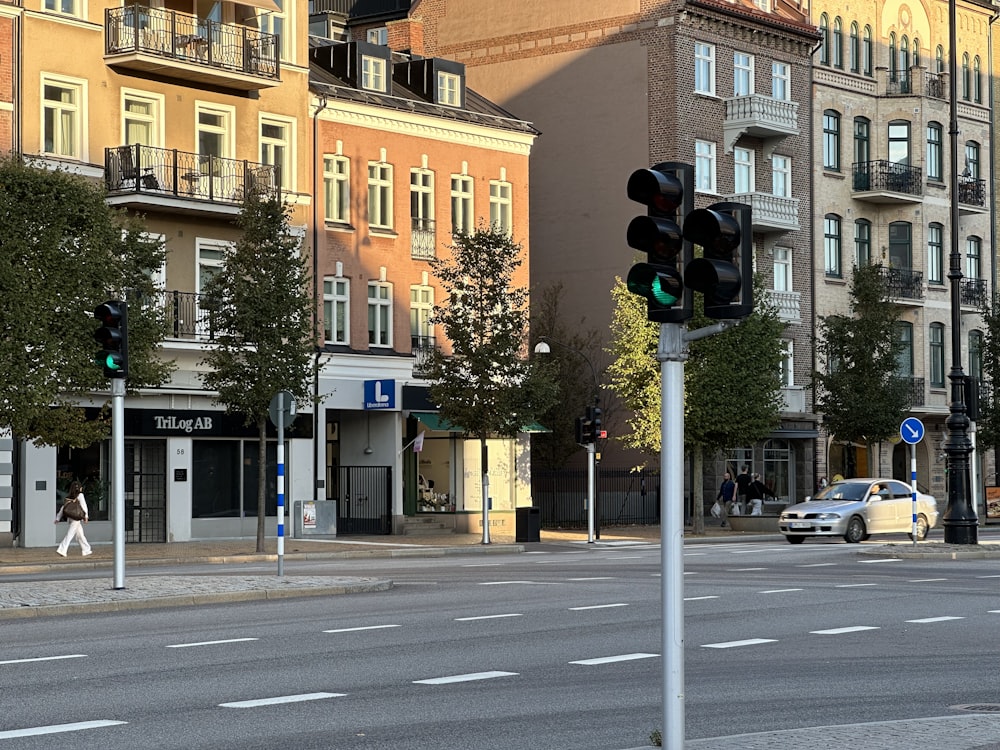 a traffic light sitting on the side of a road